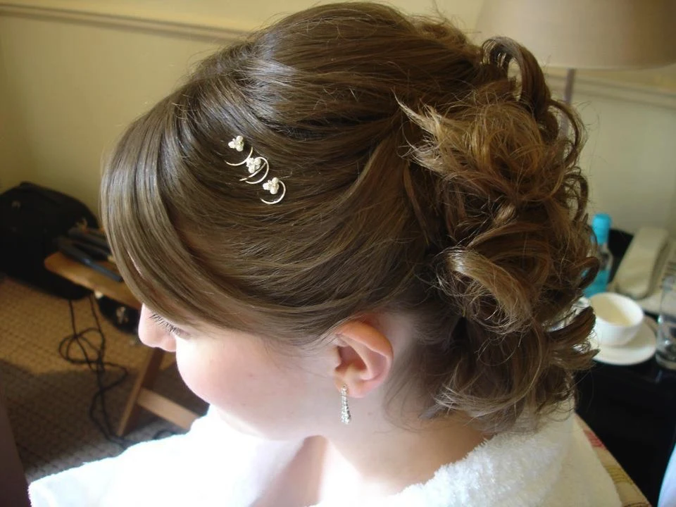 Elegant updo finished with sparkling pins