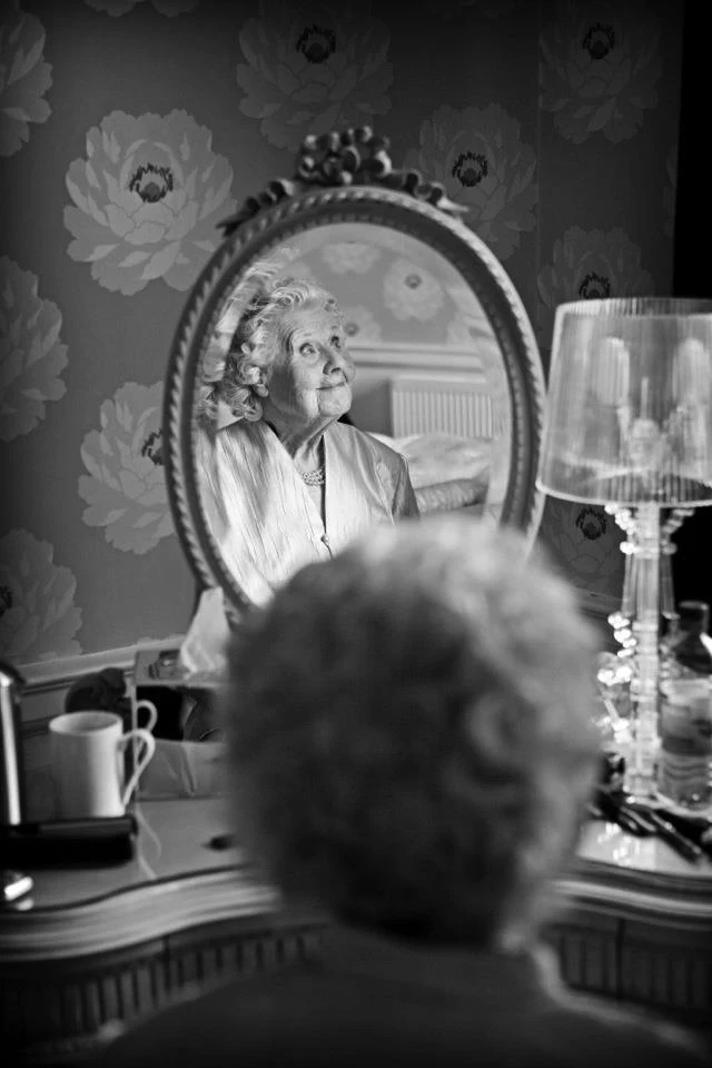 Styling in the mirror, in black and white